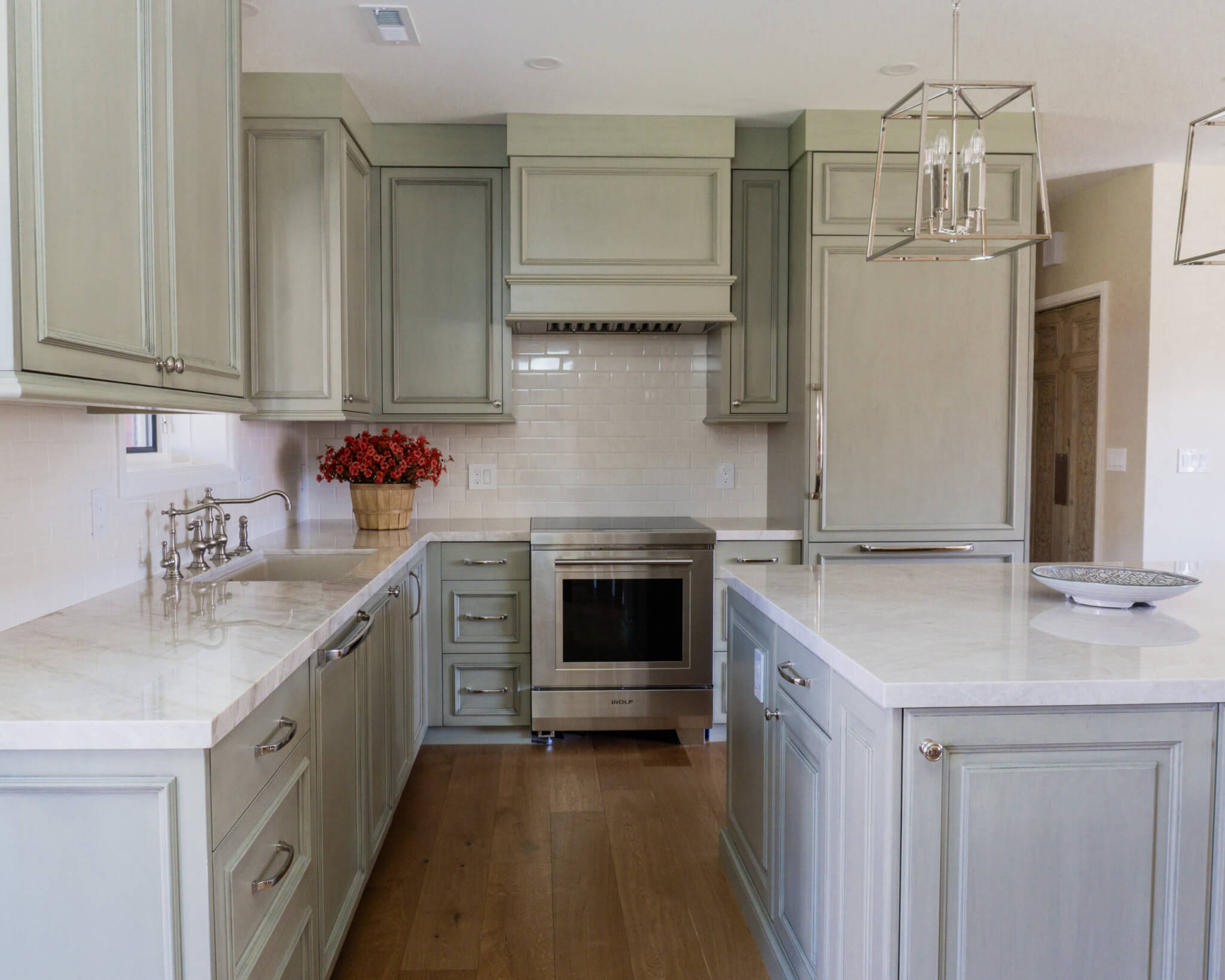 Renovated kitchen with a large island in the center.