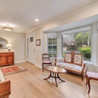 Thumbnail of http://Formal%20living%20room%20with%20a%20bay%20window%20and%20piano.