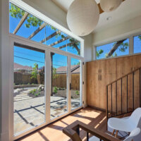Thumbnail of http://Mudroom%20addition%20with%20lots%20of%20natural%20light,%20built-in%20storage,%20and%20a%20small%20sitting%20area.