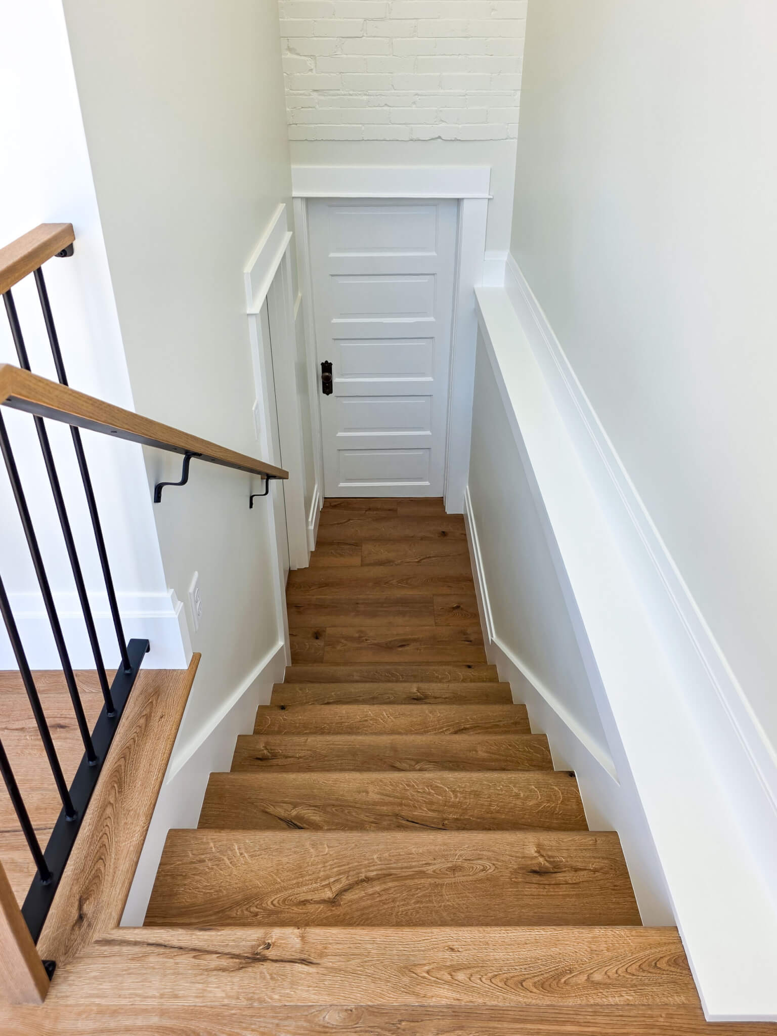 Staircase down to the new basement storage area and existing mechanical room and crawl space.