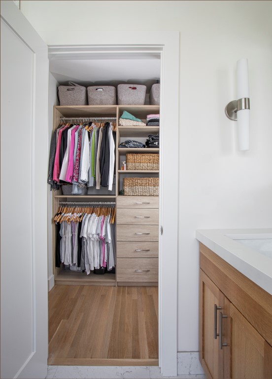View from the bathroom into the walk-through closet.