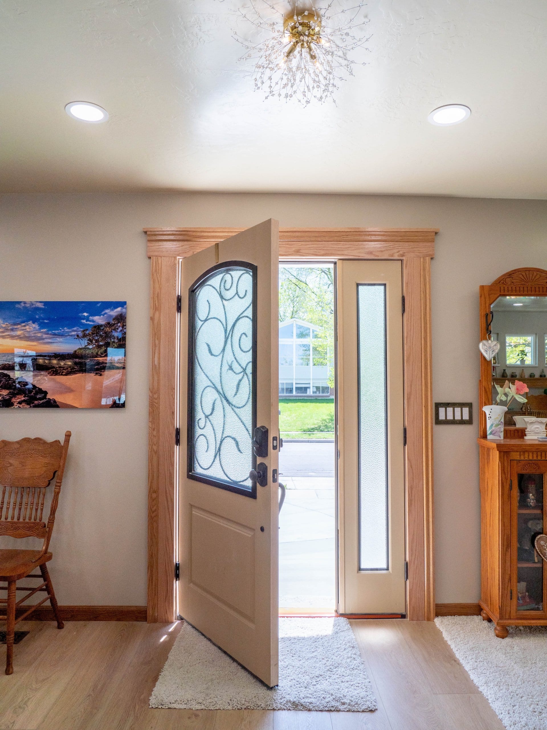 Open front door with rug in front.