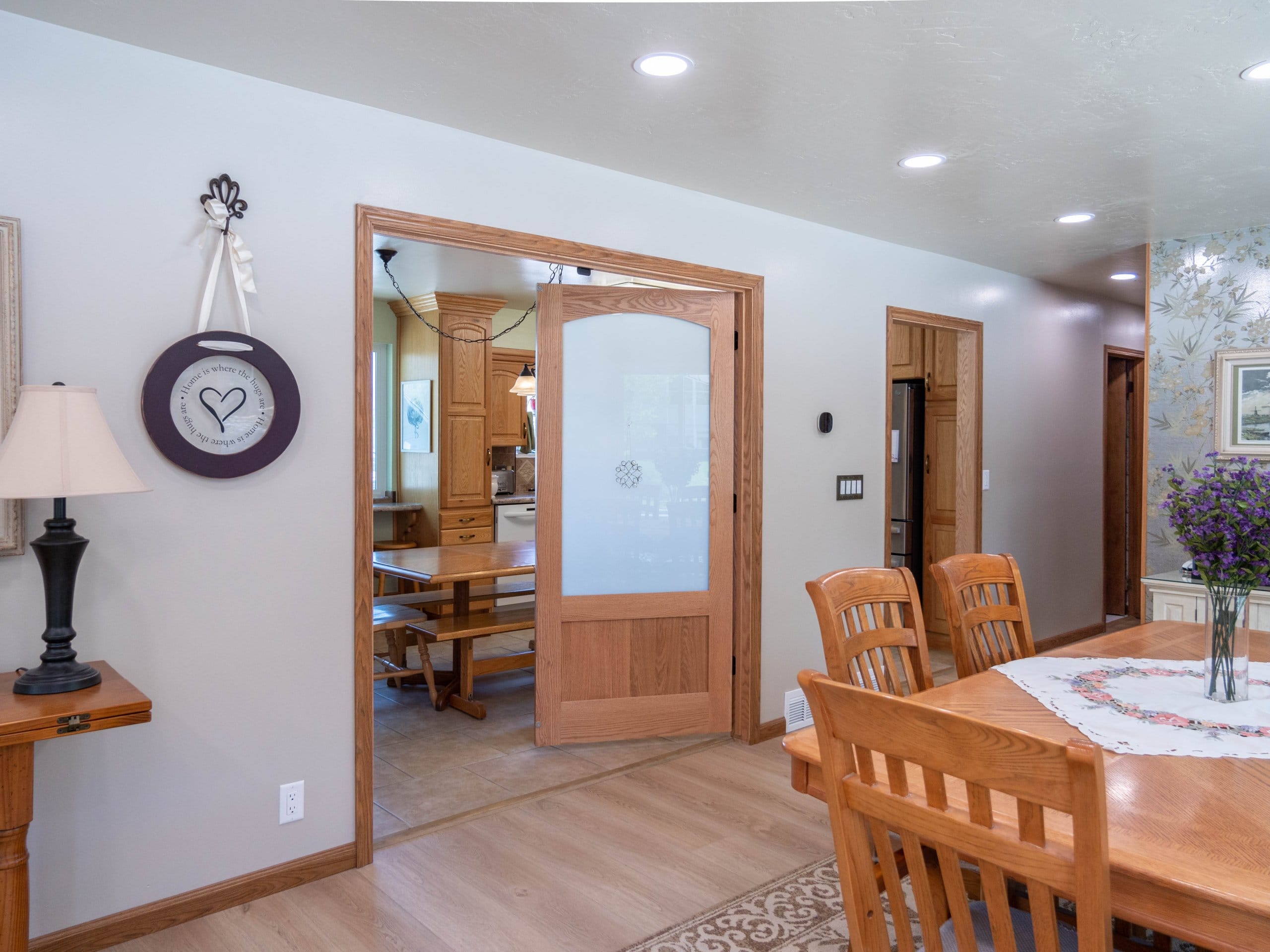 View from the dining room to the kitchen through the two doors.
