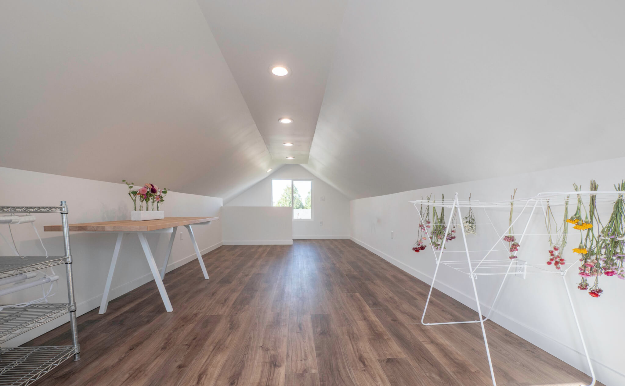 Finished garage attic looking from one side to the other.