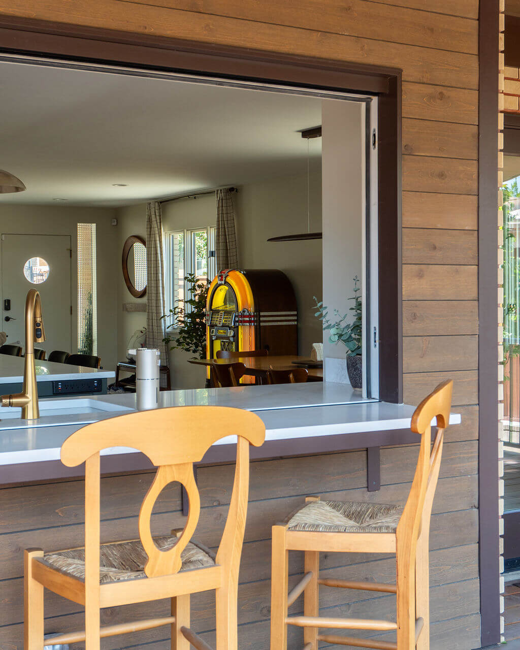 Outdoor bar that opens to the kitchen.