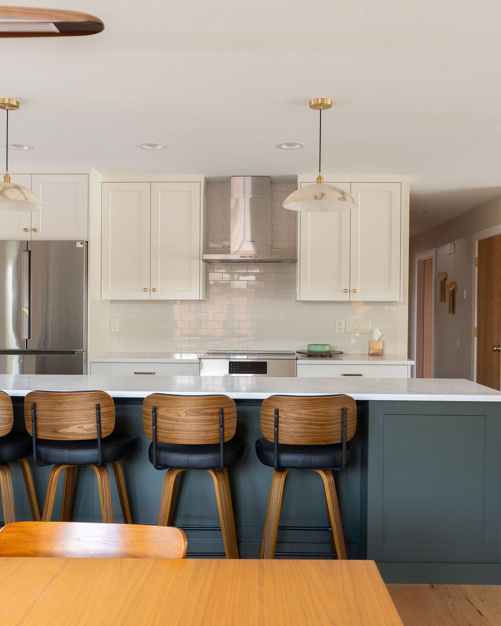 Open concept kitchen with an island. that includes seating.