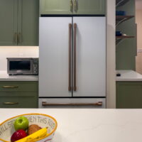 Thumbnail of http://White%20fridge%20with%20green%20cabinet%20above.