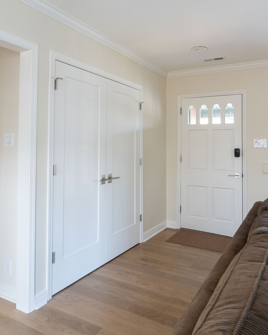 Front door of the home with closet