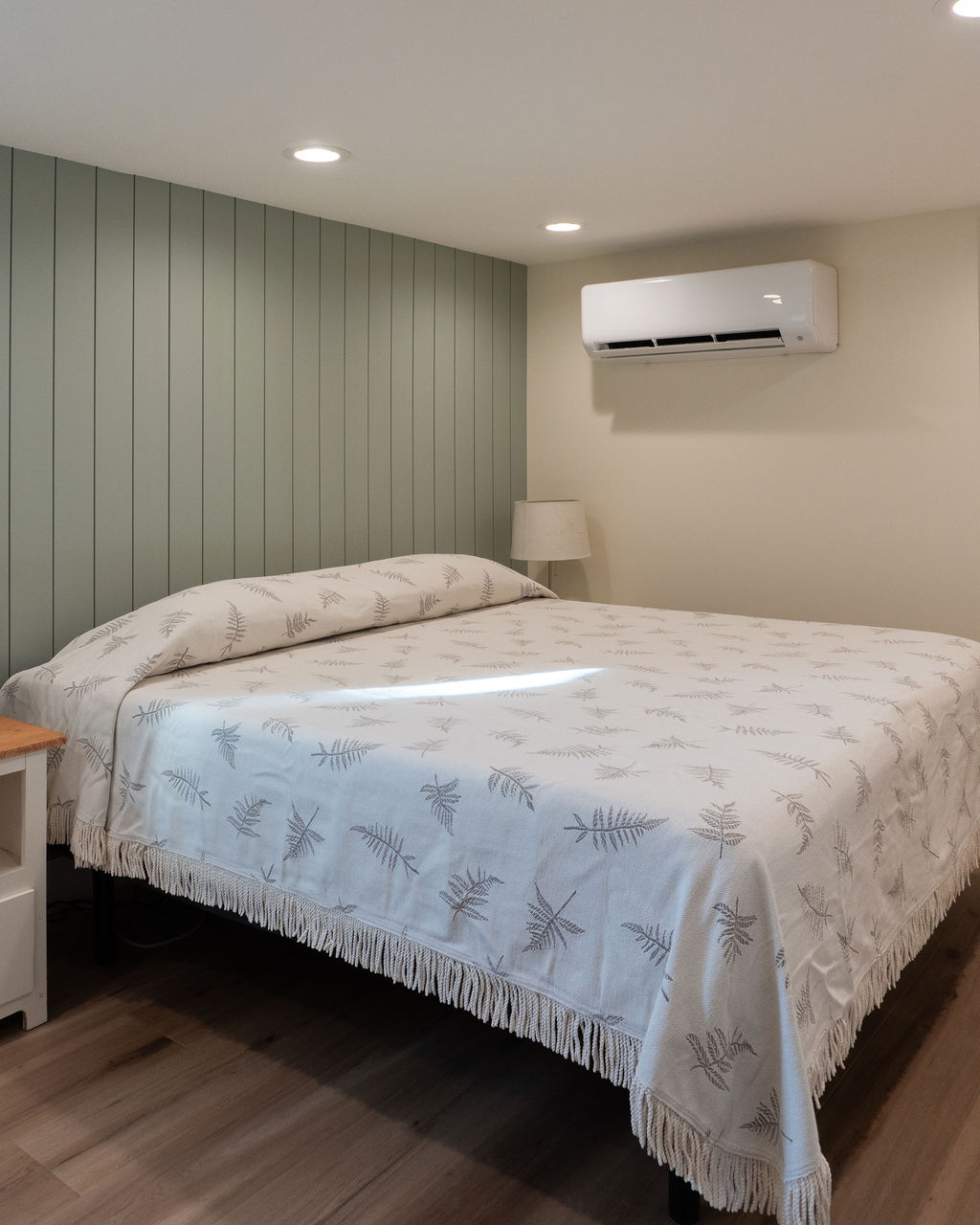 Basement bedroom with bed