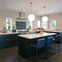 Thumbnail of http://Open%20concept%20kitchen%20in%20a%20u-shaped%20layout.%20In%20the%20center%20is%20a%20large%20island%20with%20seating.