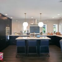 Thumbnail of http://Open%20concept%20kitchen%20in%20a%20u-shaped%20layout.%20In%20the%20center%20is%20a%20large%20island%20with%20seating.