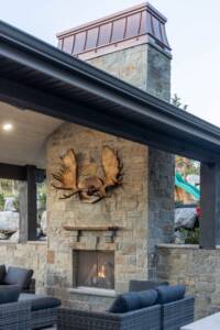 outdoor stone fireplace covered patio