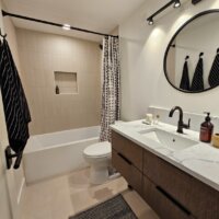 Thumbnail of http://Basement%20bathroom%20remodel%20with%20a%20tub%20and%20shower%20combination,%20toilet,%20and%20sink.