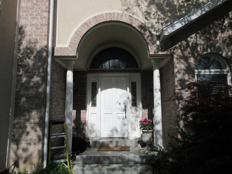 Before image of front exterior home remodel | Renovation Design Group