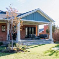 Thumbnail of http://Backyard%20covered%20patio%20with%20grill%20and%20seating.