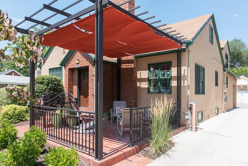 After, Exterior, front porch, pergolas, sun shades | Renovation Design Group
