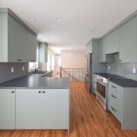 Thumbnail of http://Renovated%20kitchen%20that%20is%20open%20to%20the%20dining%20room%20and%20includes%20a%20peninsula,%20updated%20appliances,%20and%20wood%20flooring.