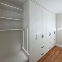 Thumbnail of http://Cabinetry%20in%20the%20new%20mudroom%20that%20includes%20a%20built-in%20bench,%20shelves,%20cabinets,%20and%20drawers.