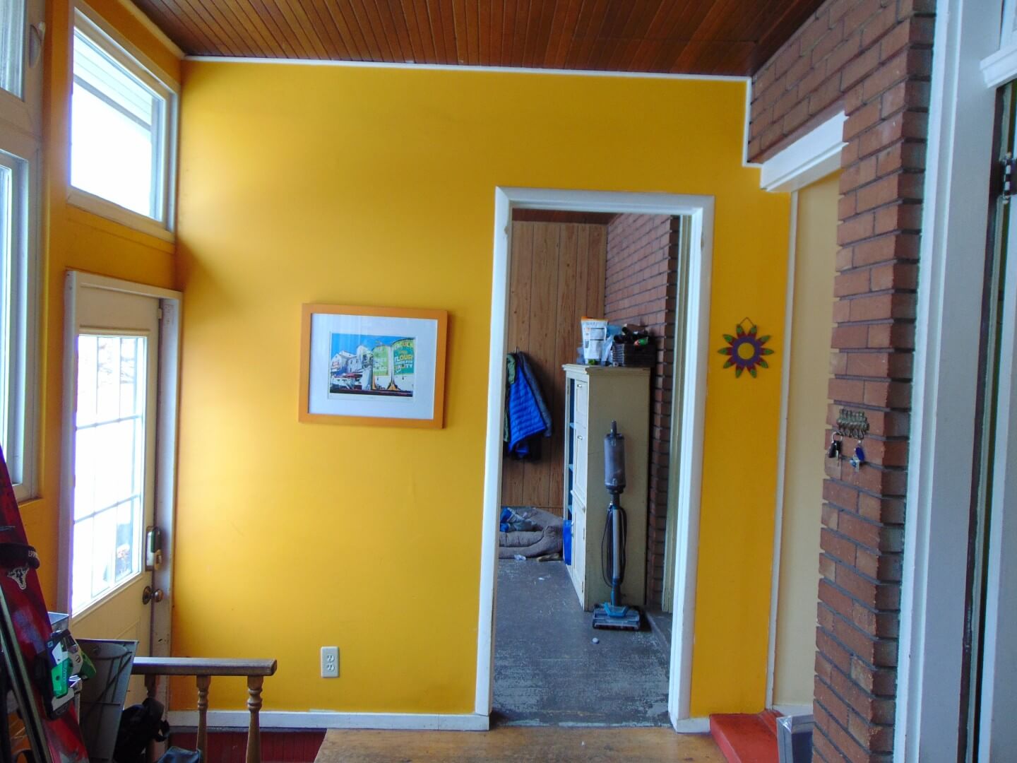 The existing addition with a wall straight ahead.