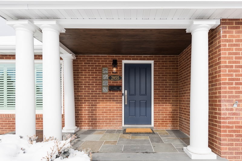 After, exterior, front porch, blue slate, blue front door, Columns | Renovation Design Group