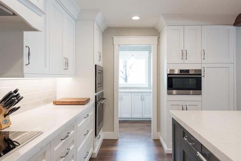 After, Kitchen Great Room, Pantry, Modern, White Cabinets, Built in Ovens, Double oven, Rambler | Renovation Design Group
