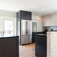 Thumbnail of http://Open%20concept%20kitchen%20and%20dining%20room.%20The%20dining%20room%20includes%20two%20large%20doors%20with%20access%20to%20the%20backyard.