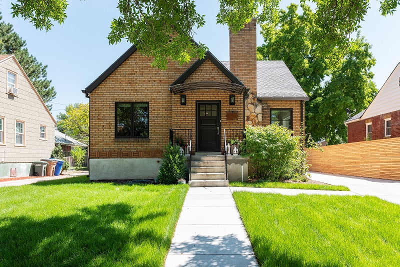 Exterior Tudor home after renovation in Salt Lake City