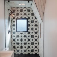 Thumbnail of http://Shower%20with%20partially%20sloped%20wall,%20window,%20and%20niche.