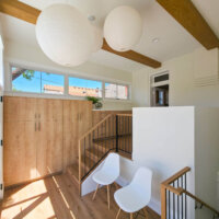 Thumbnail of http://Mudroom%20addition%20with%20lots%20of%20natural%20light,%20built-in%20storage,%20and%20a%20small%20sitting%20area.
