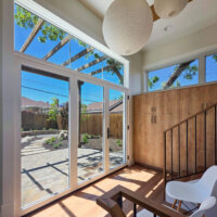 Thumbnail of http://Mudroom%20addition%20with%20lots%20of%20natural%20light,%20built-in%20storage,%20and%20a%20small%20sitting%20area.