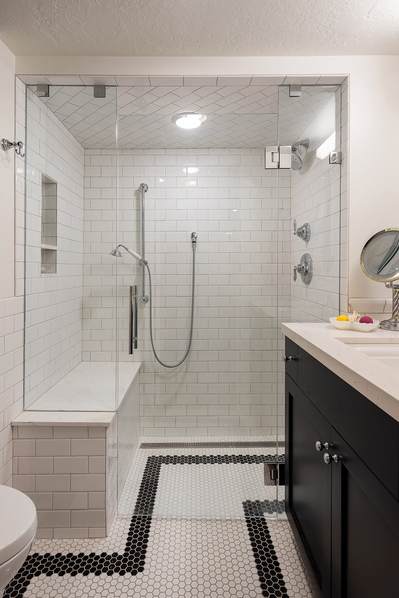 Black and white tiled basement bathroom