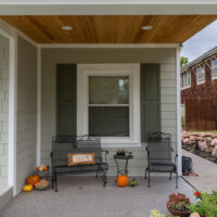 Thumbnail of http://Front%20porch%20with%20fall%20decor%20and%20outdoor%20furniture.