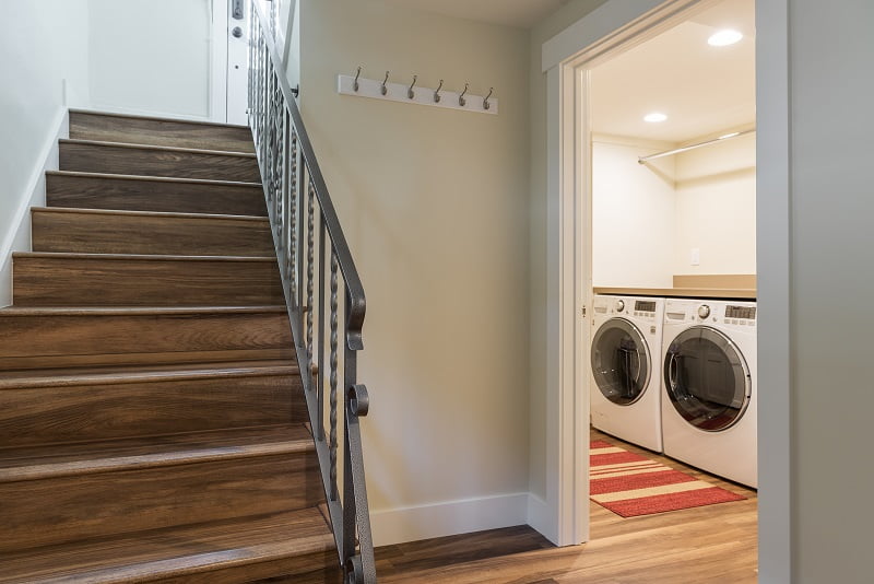 After Interior Split Stairs Basement Remodel Mudroom Laundry Room Wood Floors Bungalow | Renovation Design Group