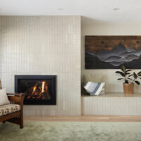 Thumbnail of http://Living%20room%20fireplace%20with%20built-in%20bench%20next%20to%20it