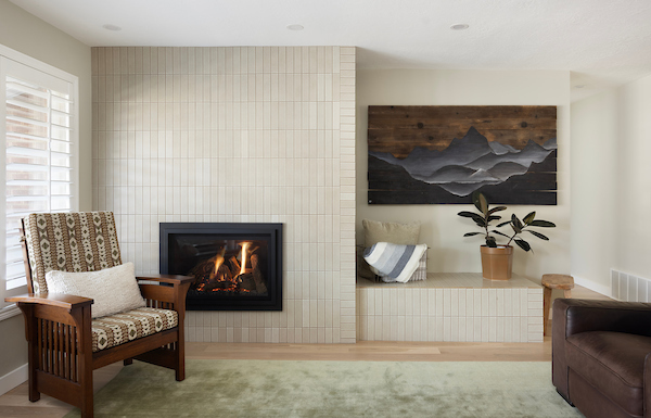 Living room fireplace with built-in bench next to it