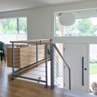 Thumbnail of http://Split%20level%20home%20staircase%20down%20to%20the%20front%20door.