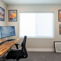 Thumbnail of http://Carpeted%20office%20with%20a%20large%20window,%20pictures%20hung%20on%20the%20wall,%20and%20a%20desk%20that%20has%20two%20monitors.