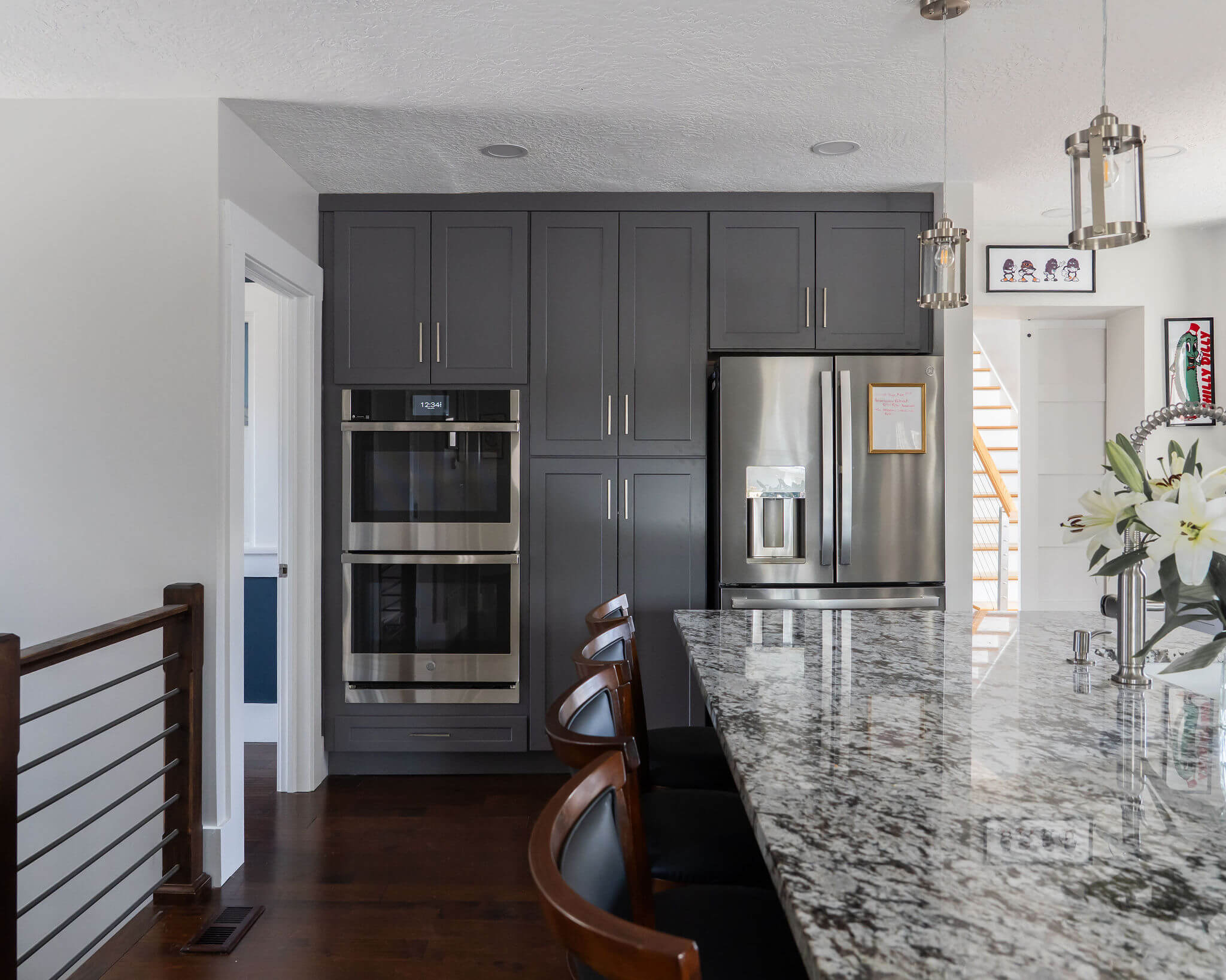 Renovated kitchen featuring an open concept layout with lots of storage, a large island, and clear sightlines.