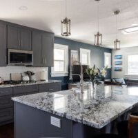 Thumbnail of http://Renovated%20kitchen%20featuring%20an%20open%20concept%20layout%20with%20lots%20of%20storage,%20a%20large%20island,%20and%20clear%20sightlines.