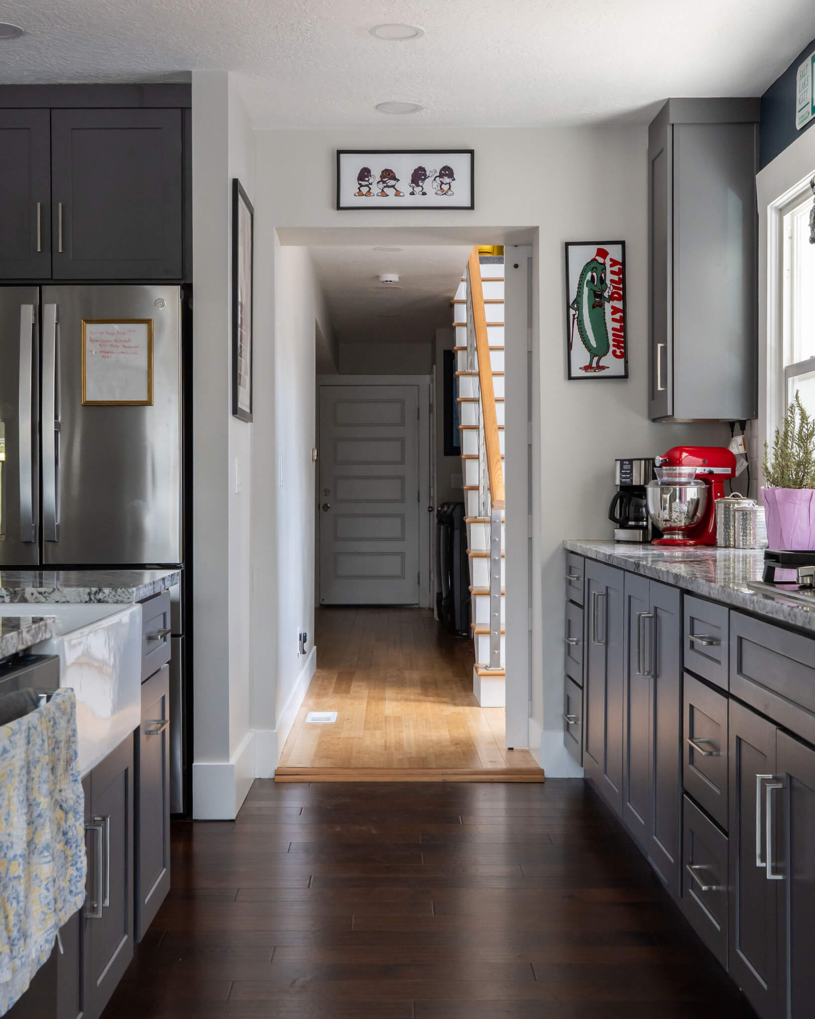 Hallway opening between the renovated kitchen and rear addition from phase I.
