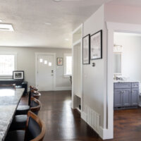Thumbnail of http://Open%20concept%20great%20room%20looking%20from%20the%20kitchen%20to%20the%20front%20door.%20On%20the%20left%20is%20a%20small%20peek%20to%20the%20kitchen,%20and%20on%20the%20right%20is%20a%20hallway%20and%20door%20to%20the%20powder%20bathroom.