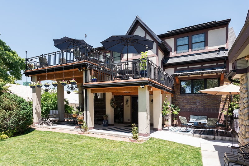 BAck patio, Tudor Exterior, Second Story Addition, Outdoor Spaces | Renovation Design Group