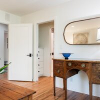 Thumbnail of http://Office%20with%20doors%20open%20to%20the%20hallway%20and%20closet.
