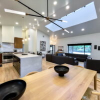 Thumbnail of http://Large%20and%20open%20concept%20great%20room%20looking%20from%20the%20dining%20room%20to%20the%20living%20room%20and%20kitchen.