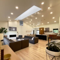 Thumbnail of http://Large%20great%20room%20with%20vaulted%20ceilings%20and%20an%20open%20concept%20living%20room,%20dining%20room,%20and%20kitchen.