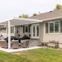 Thumbnail of http://Renovated%20back%20patio%20with%20a%20retractable%20pergola.