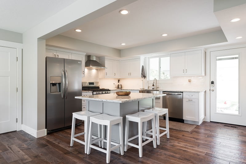 Cape Home, Open floor Plan, Kitchen remodels, Great room, white cabinets, modern designs | Renovation Design Group