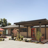 Thumbnail of http://Back%20of%20house%20featuring%20covered%20and%20uncovered%20sections%20of%20the%20patio.