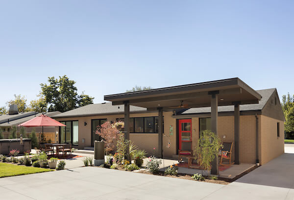 Back of house featuring covered and uncovered sections of the patio.