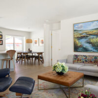 Thumbnail of http://Open%20concept%20living%20room%20looking%20from%20the%20thoughtfully%20designed%20living%20room%20to%20the%20dining%20room%20and%20kitchen.